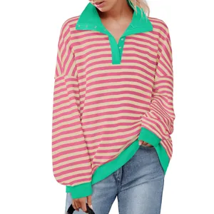 Close-up detail of women's contrast lapel button-up striped long sleeve casual sweatshirt top.