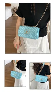 Detailed view of women quilted chain shoulder bag, glossy light blue cross body square purse.