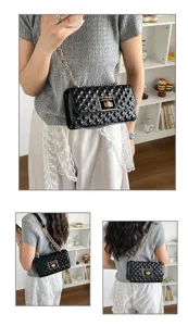 Black patent quilted chain shoulder bag with gold hardware and lock detail for women.
