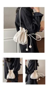 Sac seau minimaliste blanc uni à cordon de serrage vue détaillée, sac bandoulière de mode.
