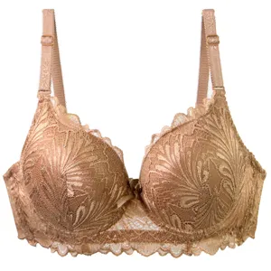 Exquisite lace bra detail featuring intricate floral embroidery, delicate adjustable straps and scalloped