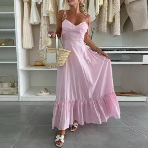 Elegant pink spaghetti strap long dress for women, perfect for summer vacation and stylish daily wear.