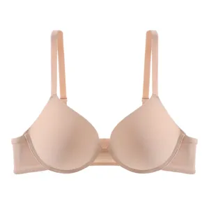 Detailed view of a nude seamless wireless push-up bra, smooth moulded cups daily wear.