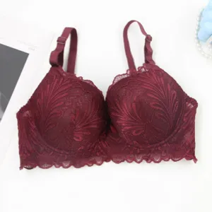 Close-up detail of the elegant burgundy full lace wired bra, highlighting exquisite floral design.