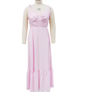 Pink V-neck spaghetti strap maxi dress with ruffled hem, perfect for casual resort wear.