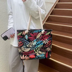 Ethnic style canvas tote bag with thick rope handles, casual shoulder bag for women daily commute.
