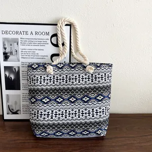 Ethnic style boho canvas tote bag with thick braided rope handles, casual geometric print.