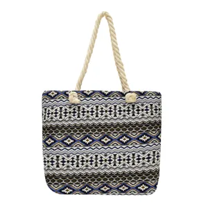 Ethnic geometric print canvas tote bag with twisted rope handles for women daily commuting.