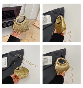Sparkly acrylic mini evening bag with metal ring handle and chic chain strap for women.