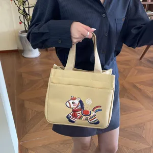 Chinesischer Stil bestickte Segeltuch Handtasche mit Fronttasche und Griffen für Alltag.