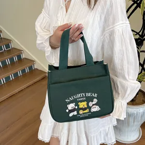 Dunkelgrüne Canvas Tragetasche mit Bären Print, große modische Freizeittasche für den Alltag.