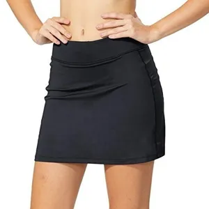 Gonna sportiva fitness nera con tasche, gonnellino sportivo fake two-piece per donna.