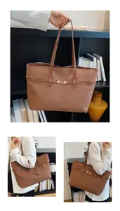 Brown vintage tote bag detail showcasing metal lock decor and double shoulder straps.