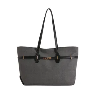 Vintage large capacity shoulder tote bag for women, stylish commuting handbag with black handles.