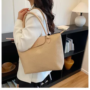 Chic woven tote bag for women, large capacity shoulder bag for daily commute and work.