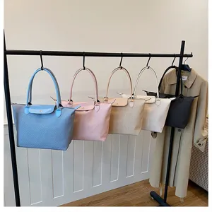 Casual soft large capacity tote shoulder bag for women daily commute and fashion daily use.