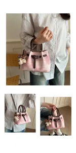 Pink tweed bucket bag with brown handles and cute dog pendant, stylish retro shoulder bag.
