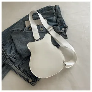 Unique guitar shaped crossbody bag in white PU leather with adjustable strap for women detail
