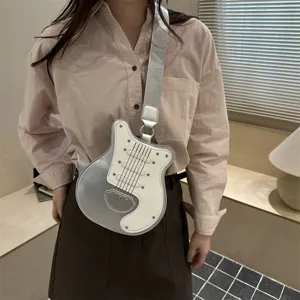 Detailed view of the trendy guitar shaped women crossbody bag with contrast color design.