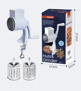 Manual nut grinder and cheese grater with stainless steel drums, kitchen hand tool.