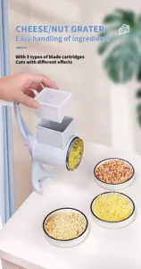Manual rotary cheese and nut grater detail view showcasing 5 interchangeable blades.