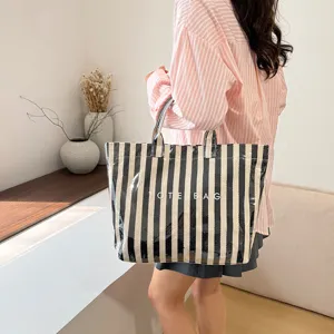 Black and white striped tote bag for women, large capacity clear handbag and stylish everyday carry.