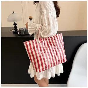 Fashion red white striped tote bag with clear PVC outer layer, stylish large capacity bag.