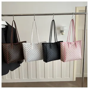 Detail view of stylish letter print tote bag featuring multiple colors and large capacity design.