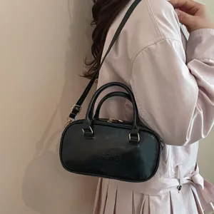 Black stylish crossbody shoulder bag for women, premium PU leather daily commute handbag.