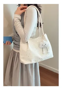 Korean style minimalist underarm tote bag for women, white star print with cute cloud charm.