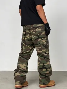 Washed camouflage cargo pants detail showing side pockets and straight fit design.