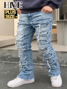 Jean homme grande taille délavé effet stacked avec patchs et finitions effilochées.