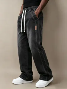 Men's casual loose straight-leg denim trousers with comfortable drawstring elastic waist.