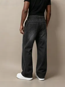 Men's distressed loose straight denim jeans with elastic drawstring waist for casual streetwear.