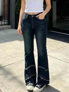 High waist dark blue flare jeans for women with raw edge split hem stretch denim trousers.