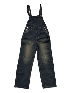 Close-up detail of dark wash denim overalls, featuring metallic buttons and front chest pocket.