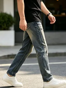 Detailed side view of men's vintage washed straight leg jeans, stylish casual street wear.