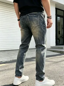 Men's washed distressed vintage straight-leg denim jeans, casual high street loose fit trousers.