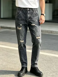 Jeans strappati da uomo, pantaloni in denim dal taglio dritto e lavaggio vintage streetwear.