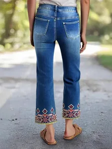 Women's embroidered cropped denim jeans, stretch slim straight pants with tribal cuffs.