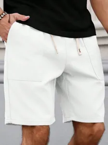 Shorts en denim blanc décontracté pour hommes été coupe ample poches cordon détail.