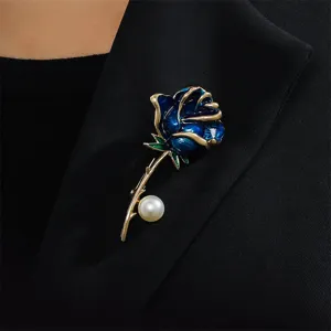 Detailed close-up of exquisite blue enamel rose brooch with elegant pearl accent pin.