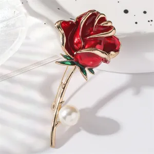 Exquisite red rose enamel brooch with pearl detail, elegant metal flower lapel pin accessory.