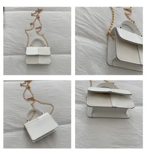 Close-up details of the white color-block mini shoulder bag with elegant gold chain strap and handle.