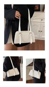 Detailansicht der weißen Leder-Umhängetasche, elegante Achseltasche mit Doppelriemen.