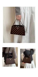 Vue détaillée d'un sac à main en cuir marron avec logo V métallique et strass scintillants.