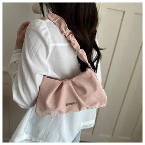 Pink ruched shoulder bag for women, trendy cloud underarm handbag with chic pleated design.