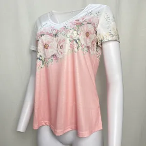Detail view of women short sleeve floral print V-neck T-shirt in pink and white gradient.