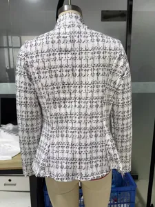 Back detail of women's slim plaid printed blazer jacket, showing tailoring and pattern.