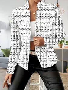 Detailed view of women's black and white plaid print slim blazer jacket showing texture and buttons.